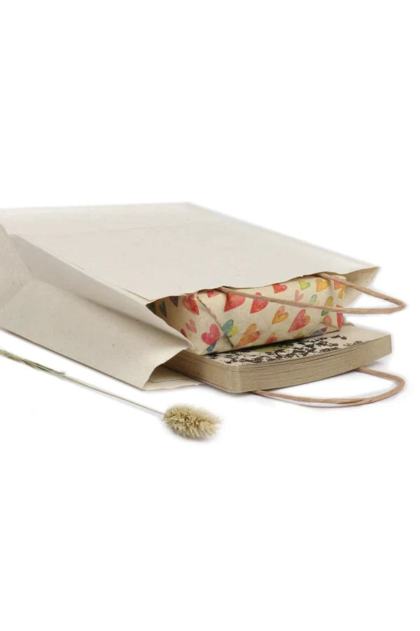 Decorative grass paper bag for gift wrapping and promotional products.